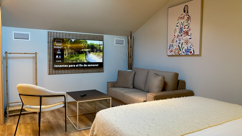 cama salon abuhardillado apartamento sanxenxo deluxe